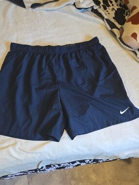 Nike Navy Blue Running Shorts with White Swoosh